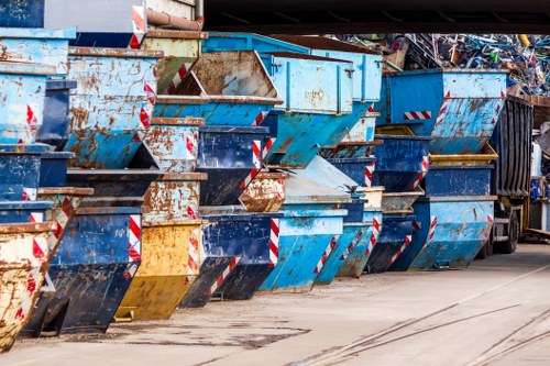 Business professionals managing waste in a West London office